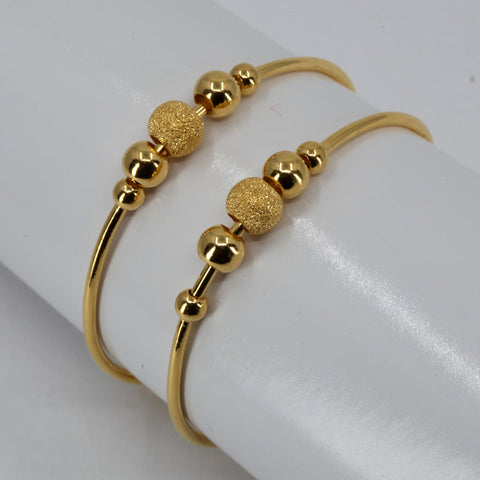 One Pair of 24K Yellow Gold Baby bangles 9.6 Grams