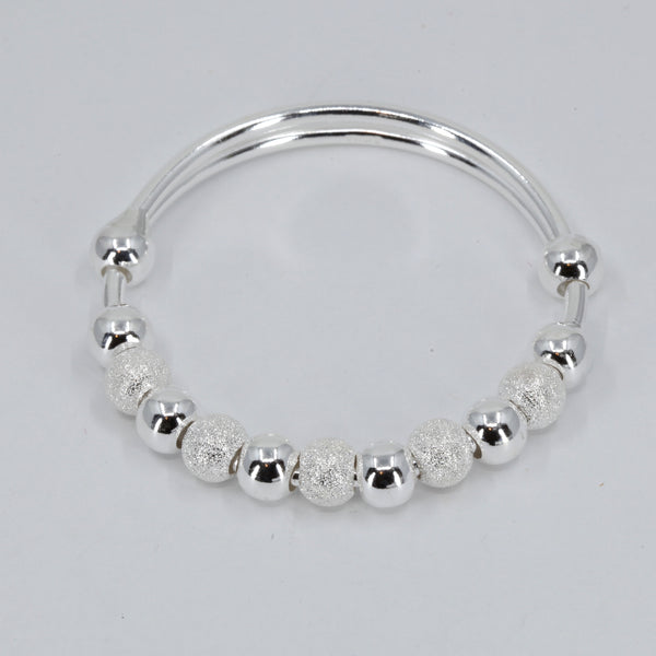 99 Sterling Silver Woman Spinning Bead Bangle 29.44 Grams